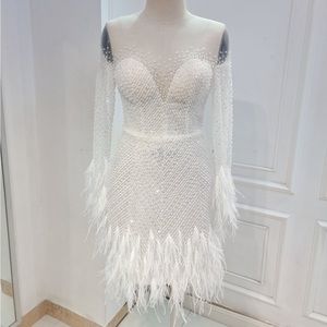 Custom luxurious short beaded and feather wedding dress, size 4